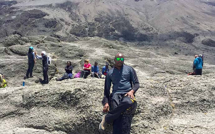 View of hikers on the remote Rongai Route of Mount Kilimanjaro