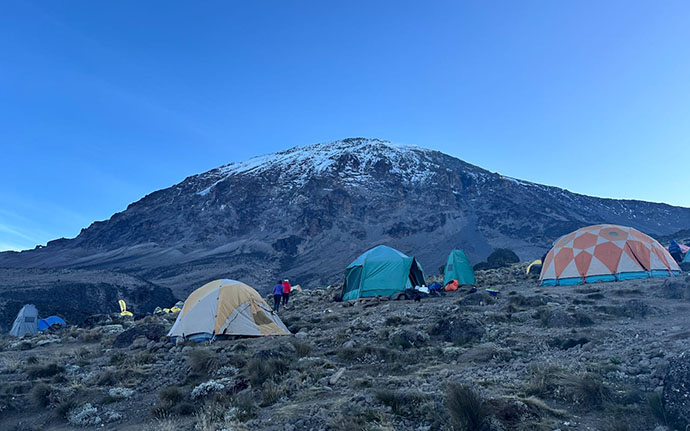 Hikers ascending the steep Umbwe Route on Mount Kilimanjaro